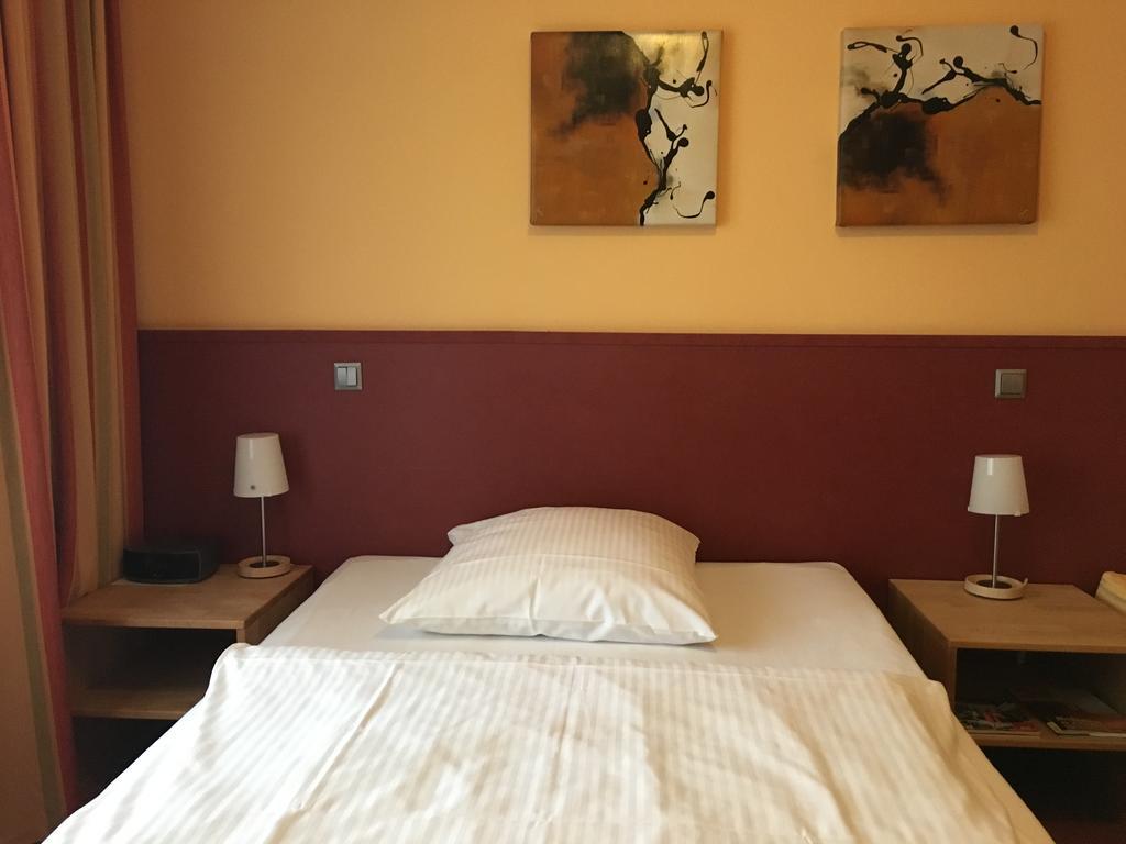 Essentis Ecohotel Берлин Стая снимка